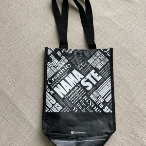 A Lululemon shopping bag in good condition